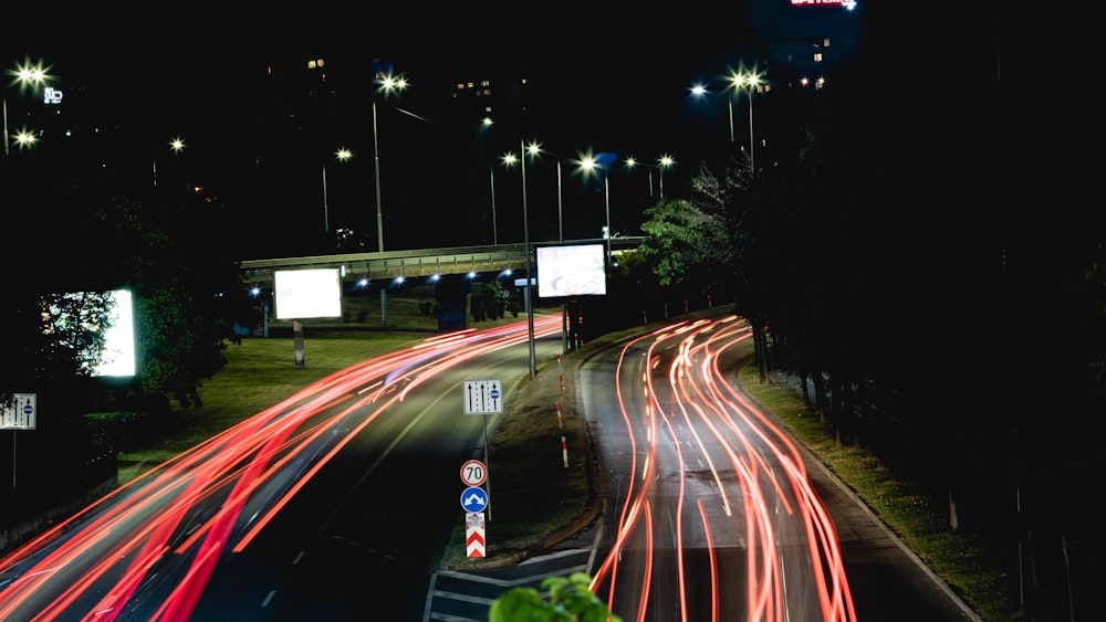 time lapse photography of cars on road during nighttime