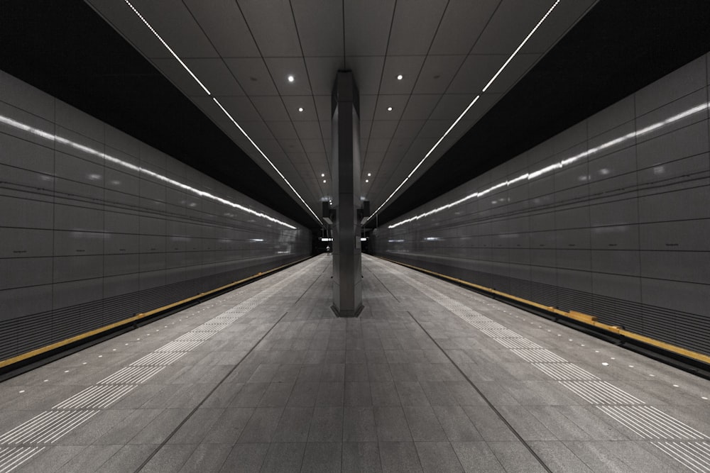 gray and white tunnel with white light