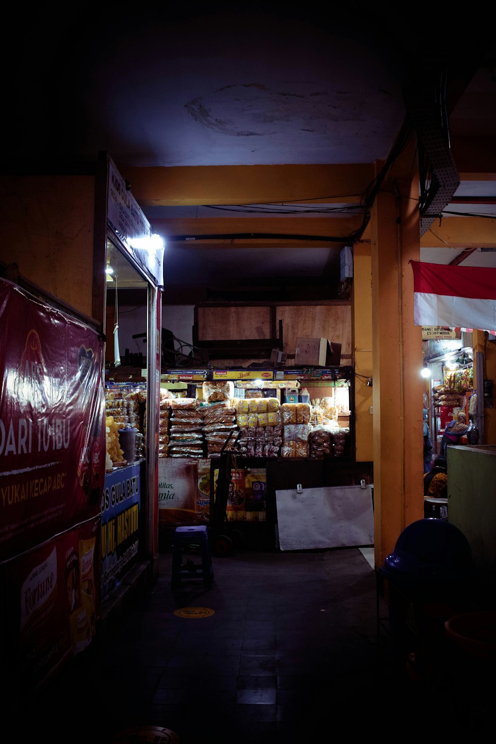 store with lights turned on during night time