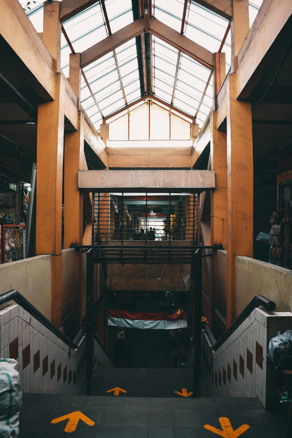 brown wooden staircase near brown wooden staircase