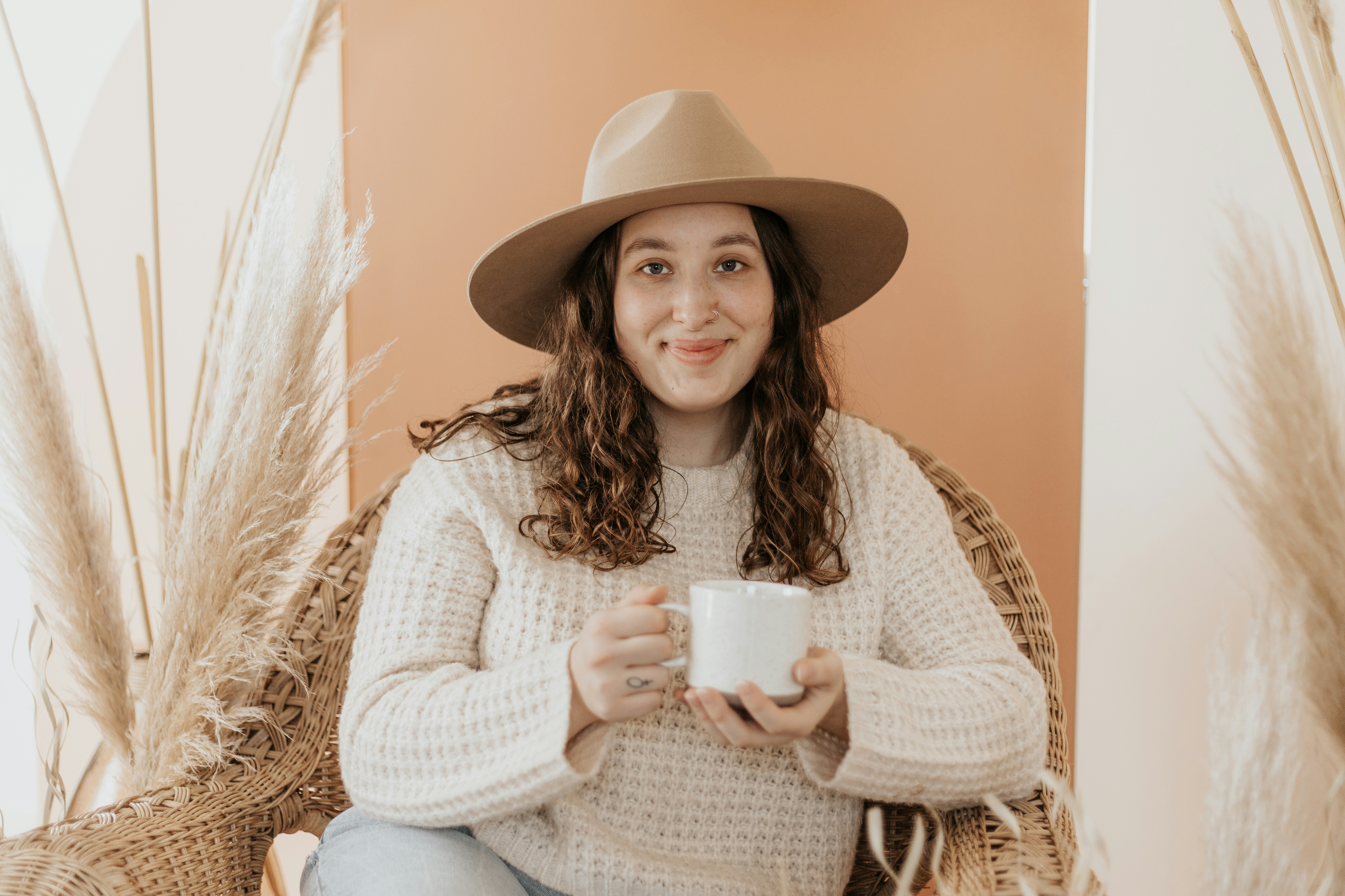 Madrona Rose, business coach for social media managers, virtual assistants and online business managers, at a boho-chic style branding shoot. To learn more about her services, head to themadronarose.com