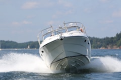 white and gray boat on sea during daytime