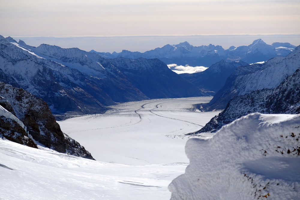 snow covered mountain during daytime