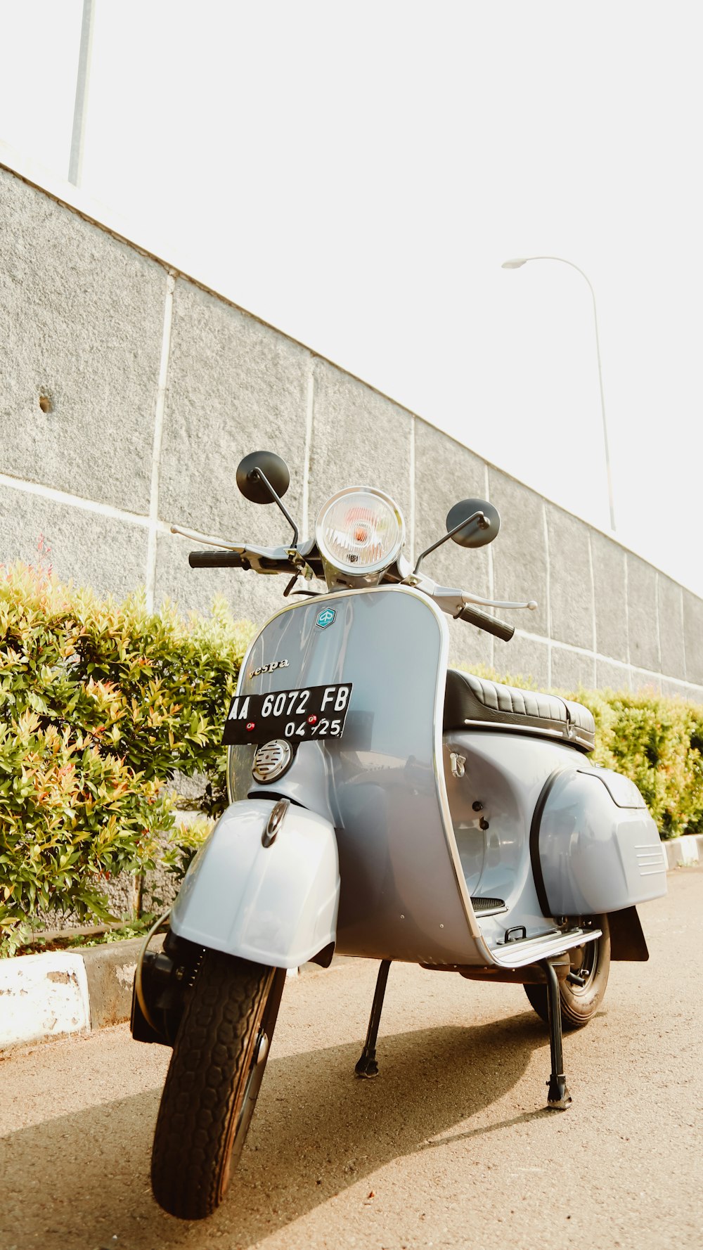 blue and gray motor scooter