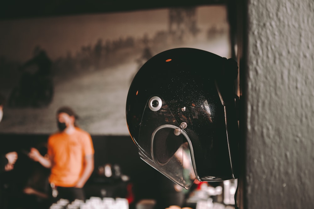 black helmet on black surface