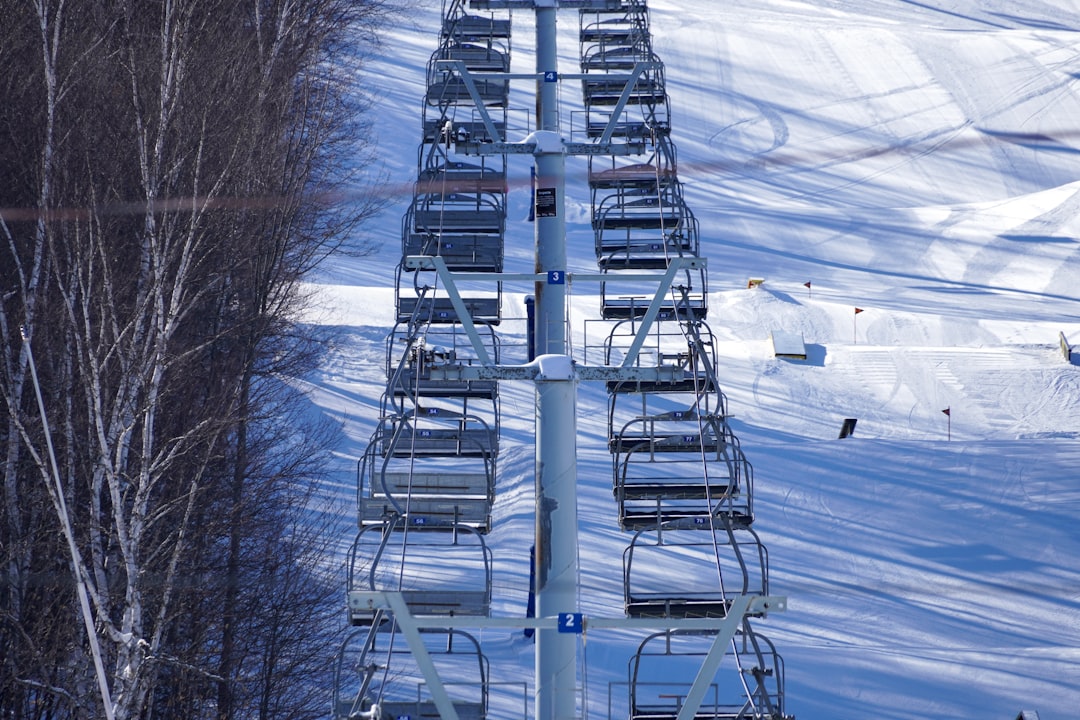 white metal tower on snow covered ground