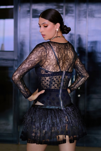 woman in black and brown floral dress