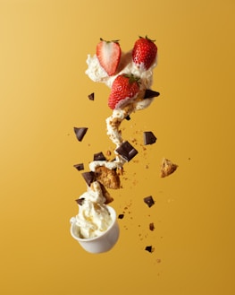 strawberry and white ice cream on white ceramic bowl