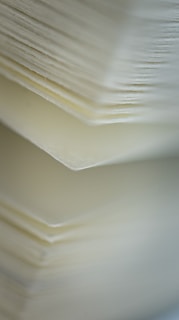 white paper on white table