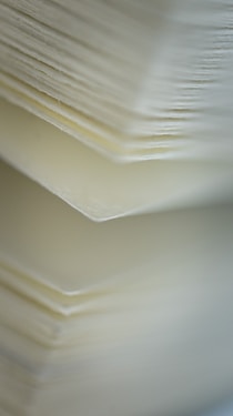 white paper on white table