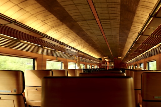 Interior view of the Classic Cabin showcasing wooden paneling and cozy seats.
