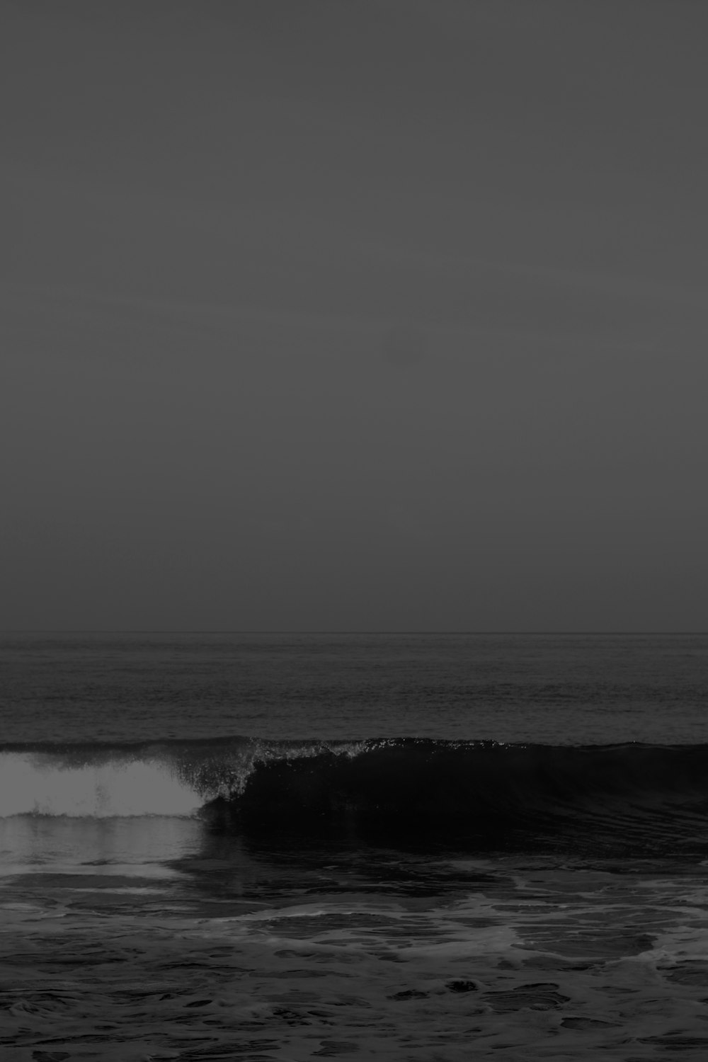 grayscale photo of ocean waves