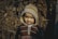 boy in brown and beige knit cap