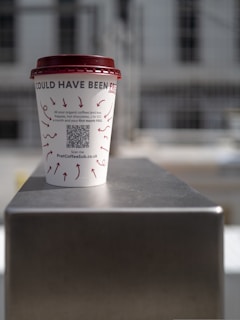 white and red plastic cup