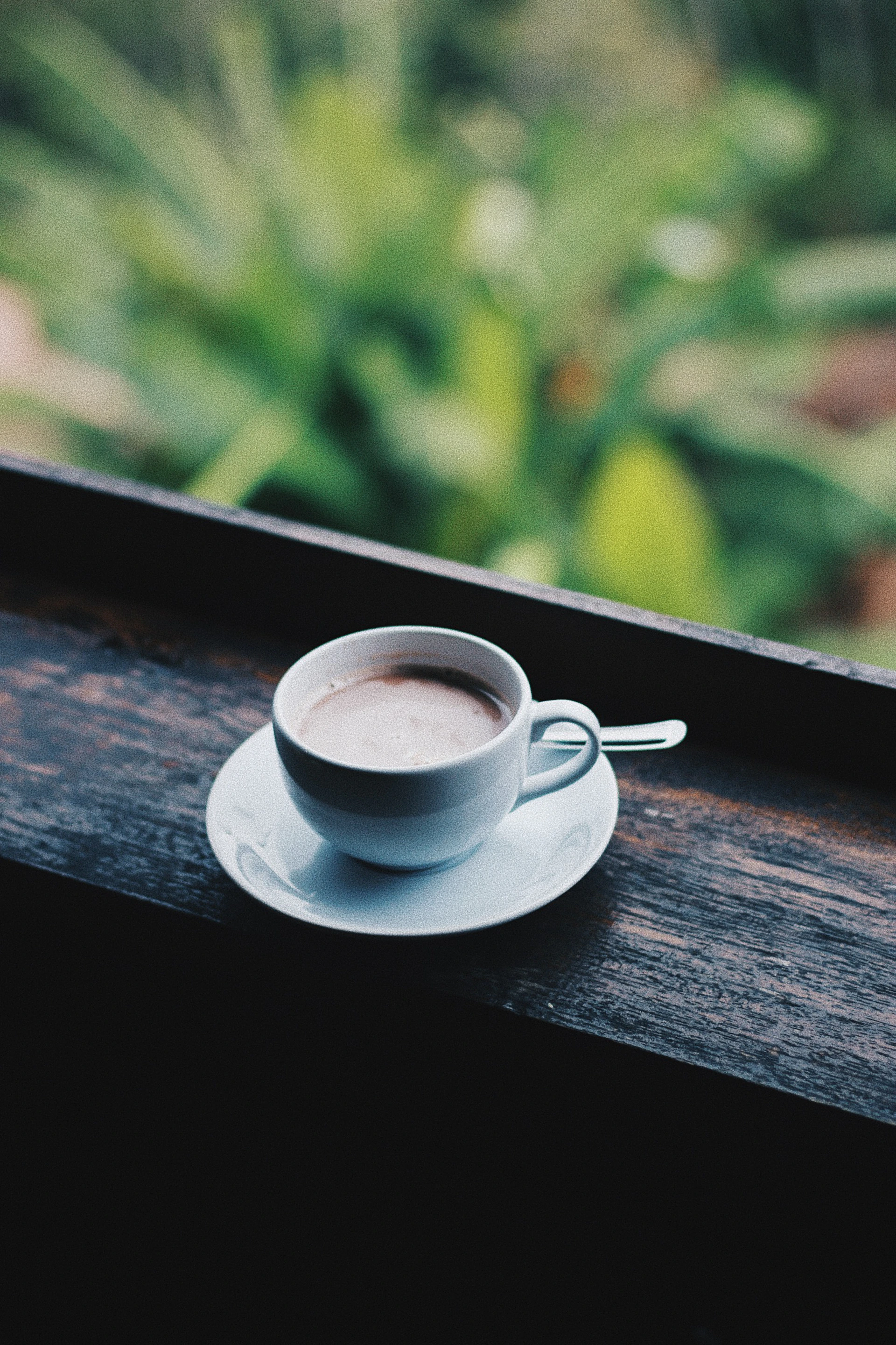 woman wearing yellow long-sleeved dress under white clouds and blue sky during daytime