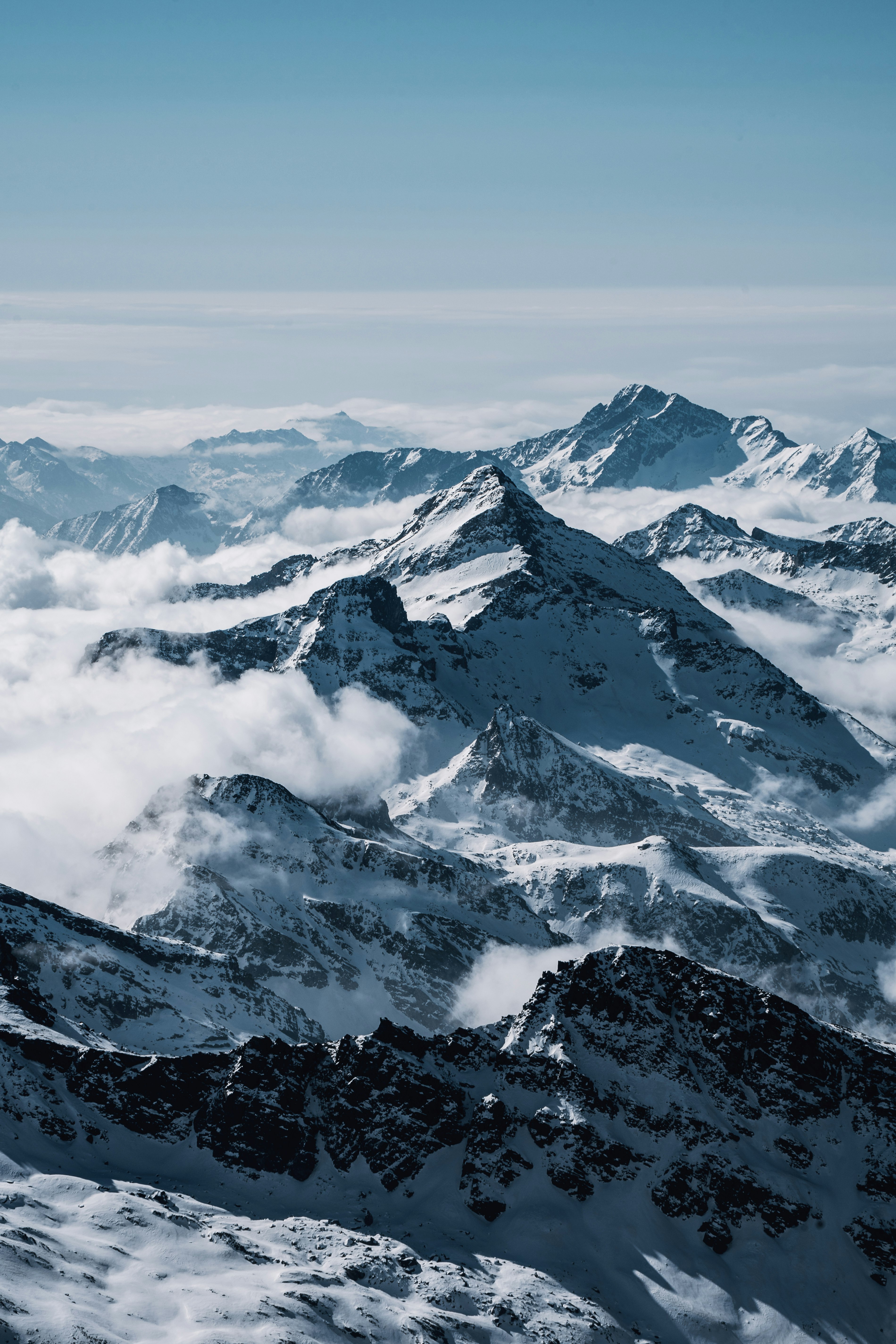 snow covered mountain during daytime