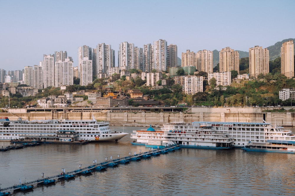 white and blue boat on body of water during daytime