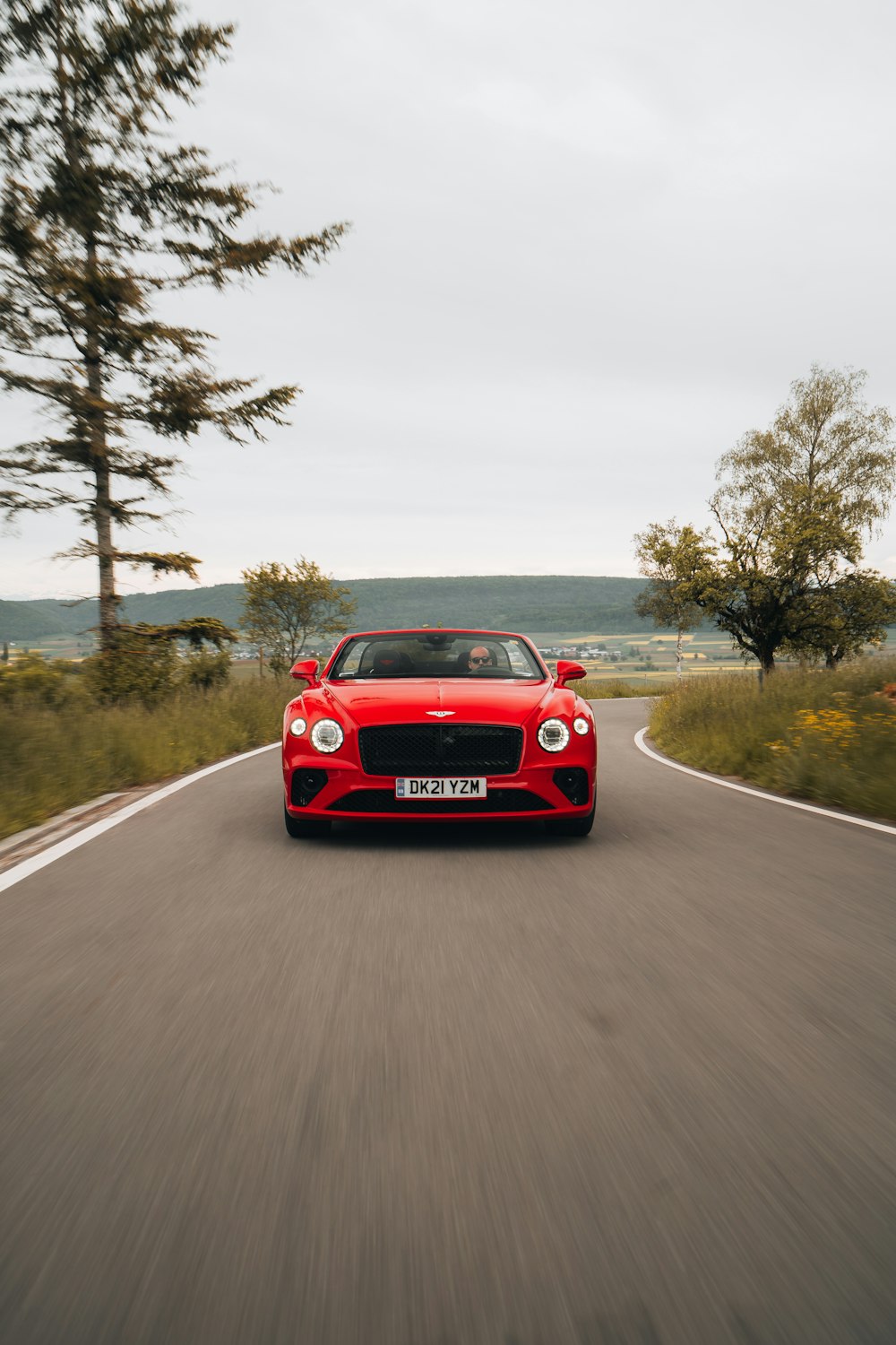 red porsche 911 on road during daytime