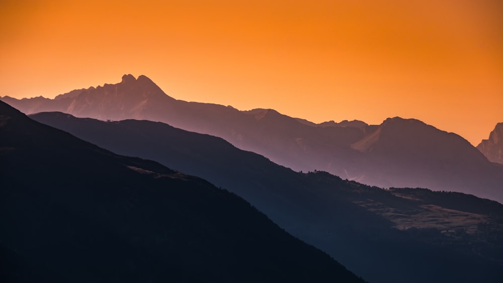 silhouette of mountains during daytime