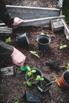 person holding black ceramic mug