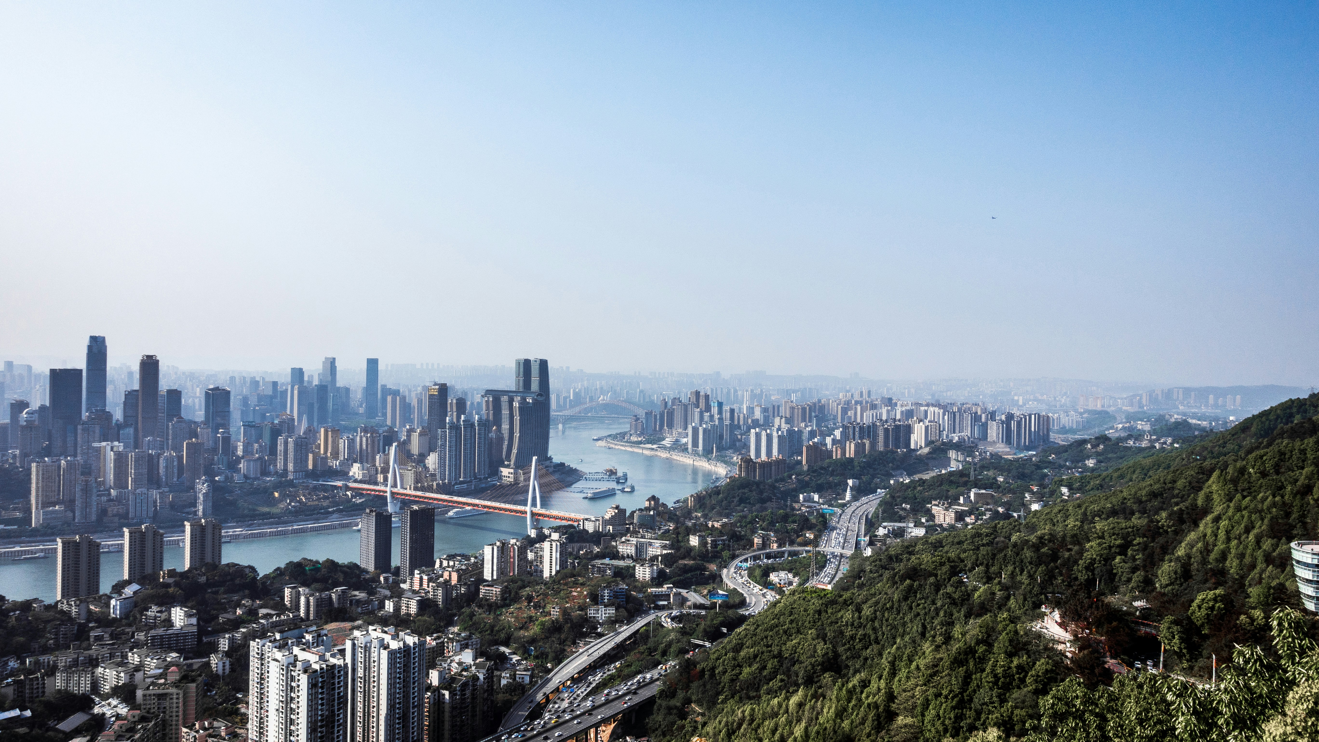 city skyline under white sky during daytime