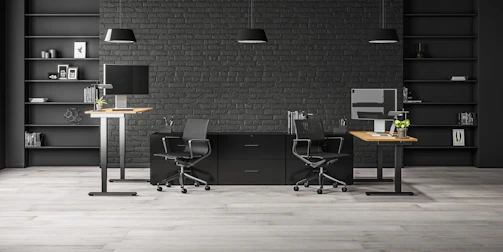 A professional workspace featuring ergonomic furniture and ambient lighting.