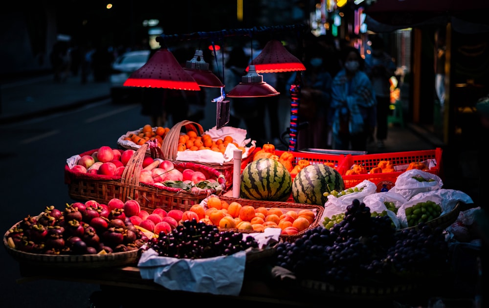 assorted fruits on display during daytime