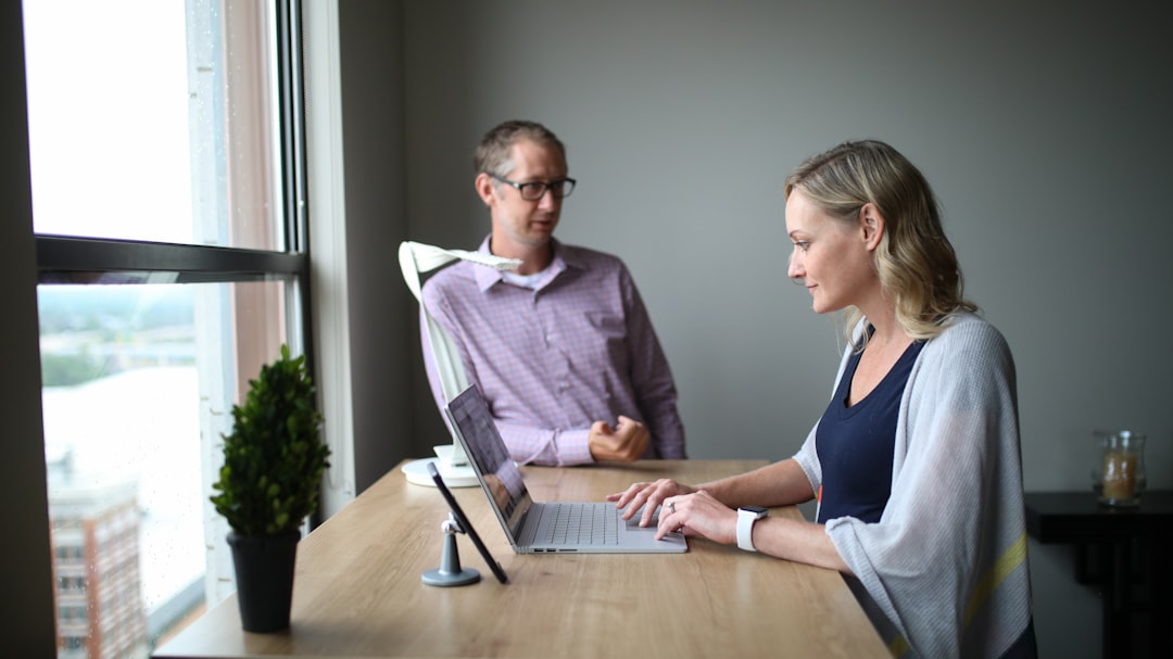 man and woman sitting at table