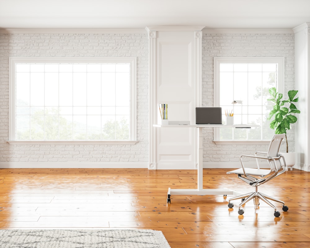 black and white area rug on brown wooden floor