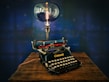 black typewriter on brown wooden table