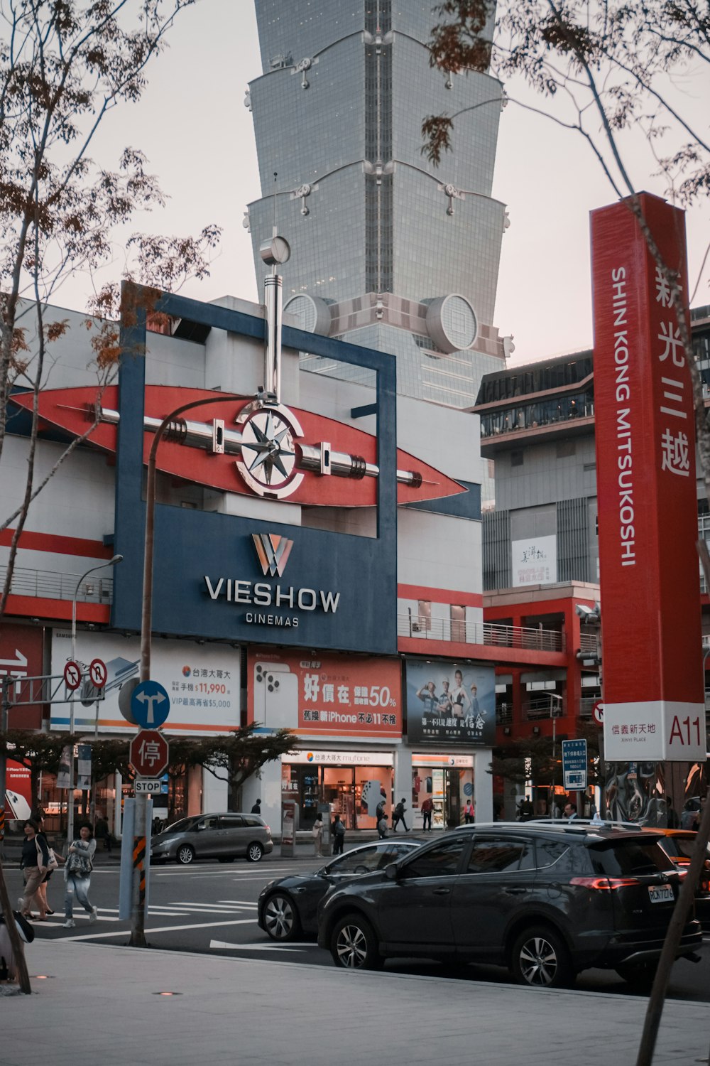 cars parked in front of building during daytime