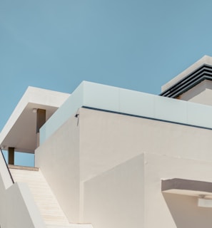 white concrete building under blue sky during daytime