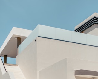 white concrete building under blue sky during daytime