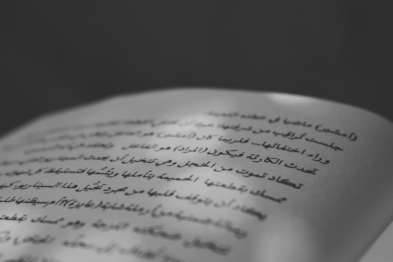Open book with Arabic text