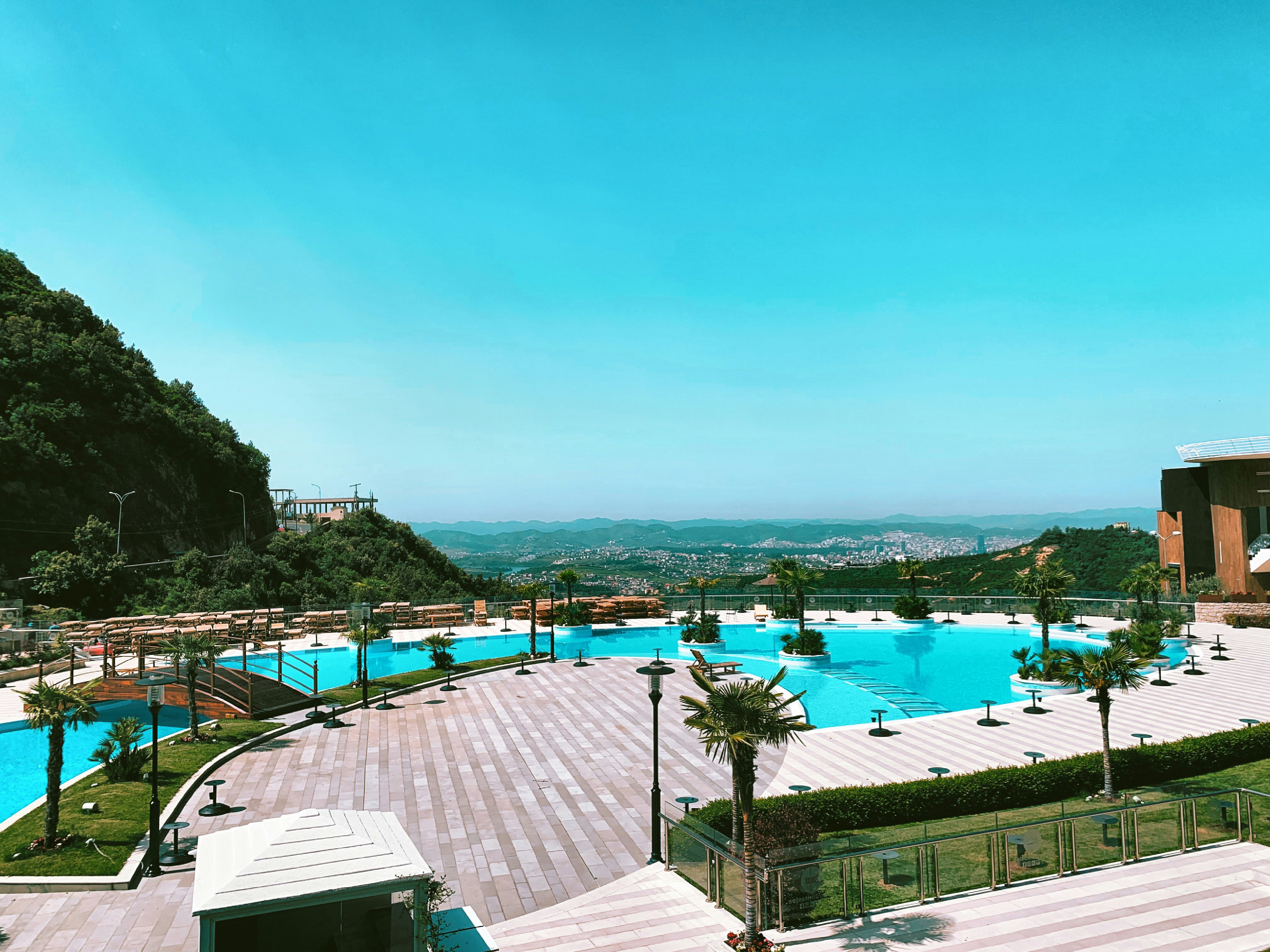 Resort-style pool with desert mountain backdrop