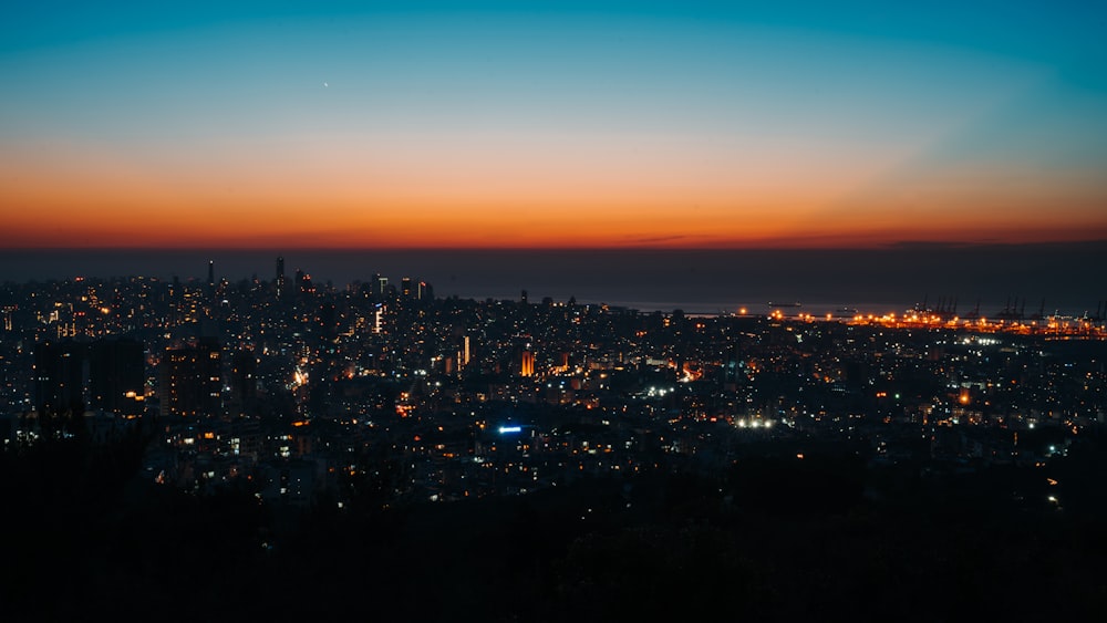 city skyline during night time