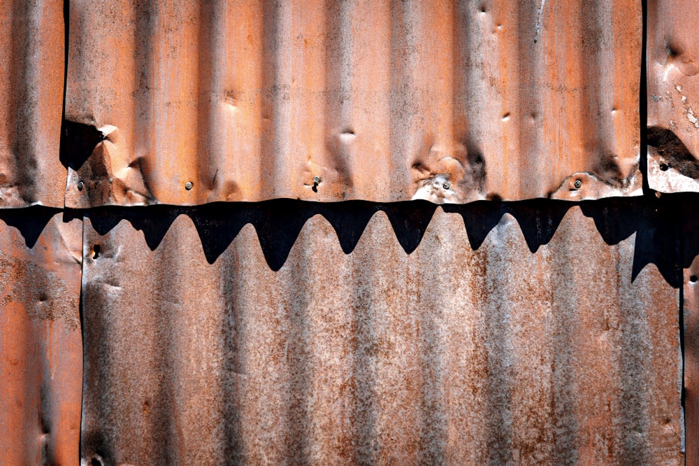 brown and black wooden fence