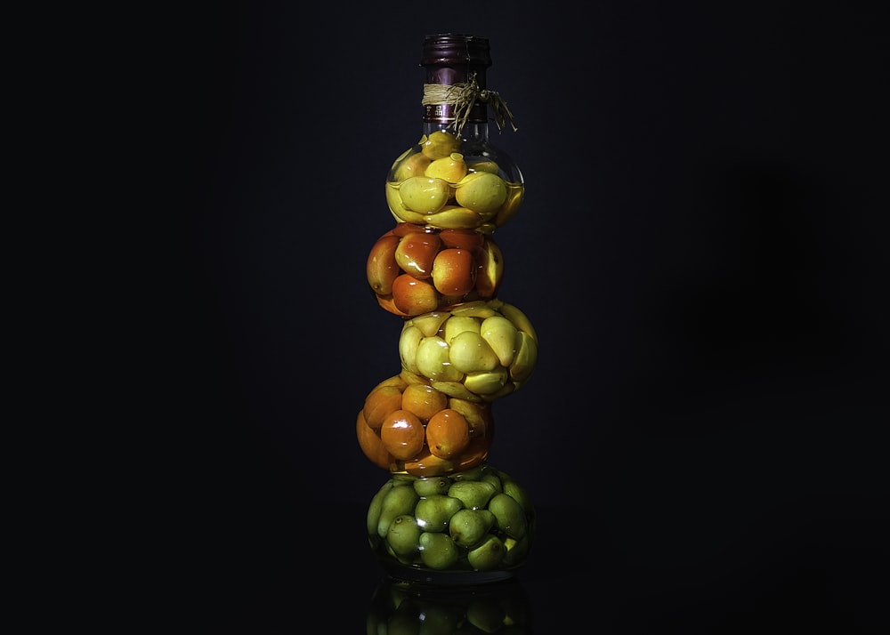 green grapes in glass bottle