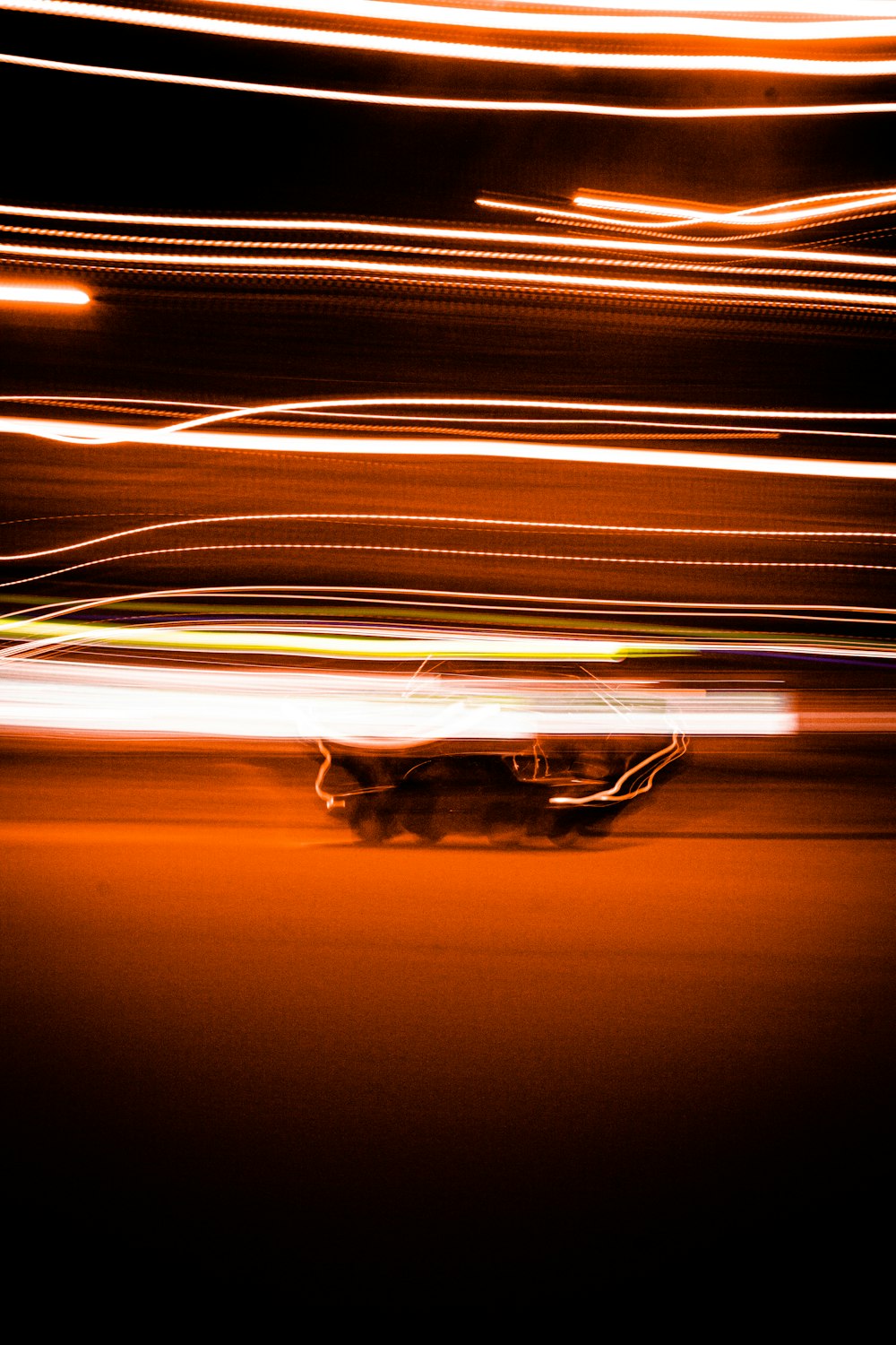 time lapse photography of cars on road during night time