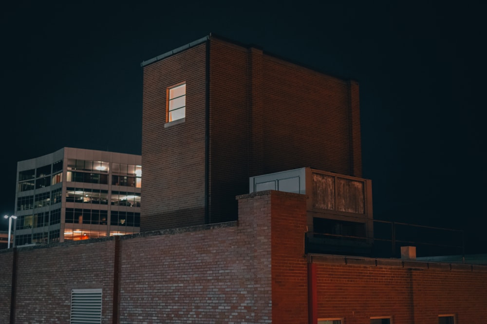 brown concrete building during night time