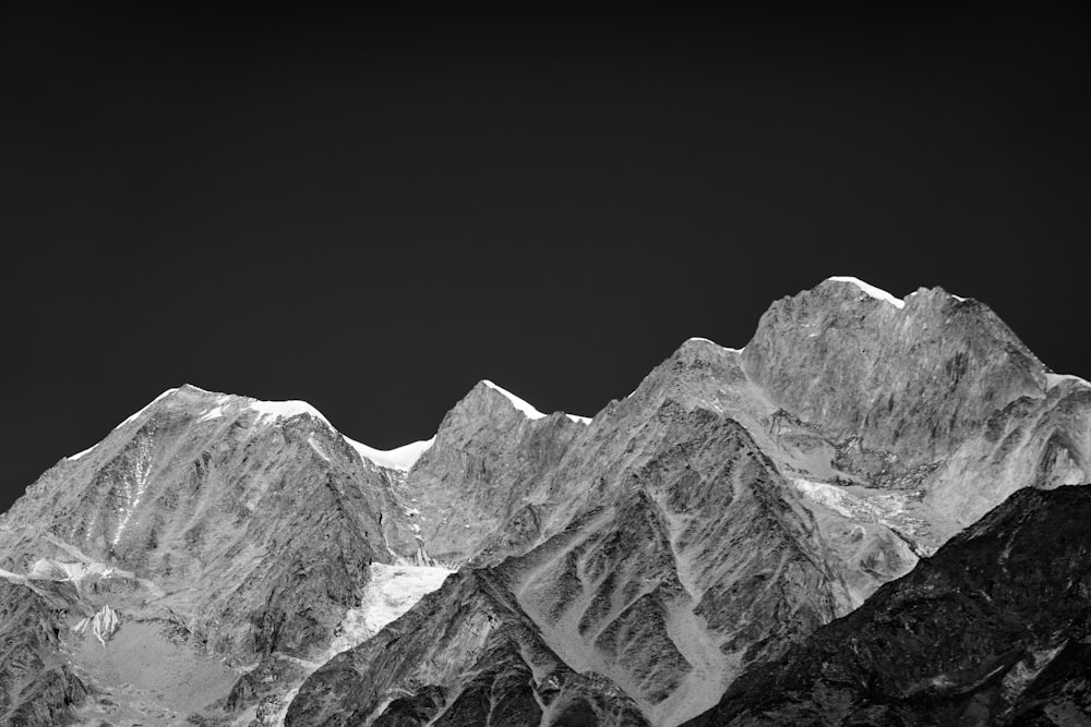 grayscale photo of rocky mountain