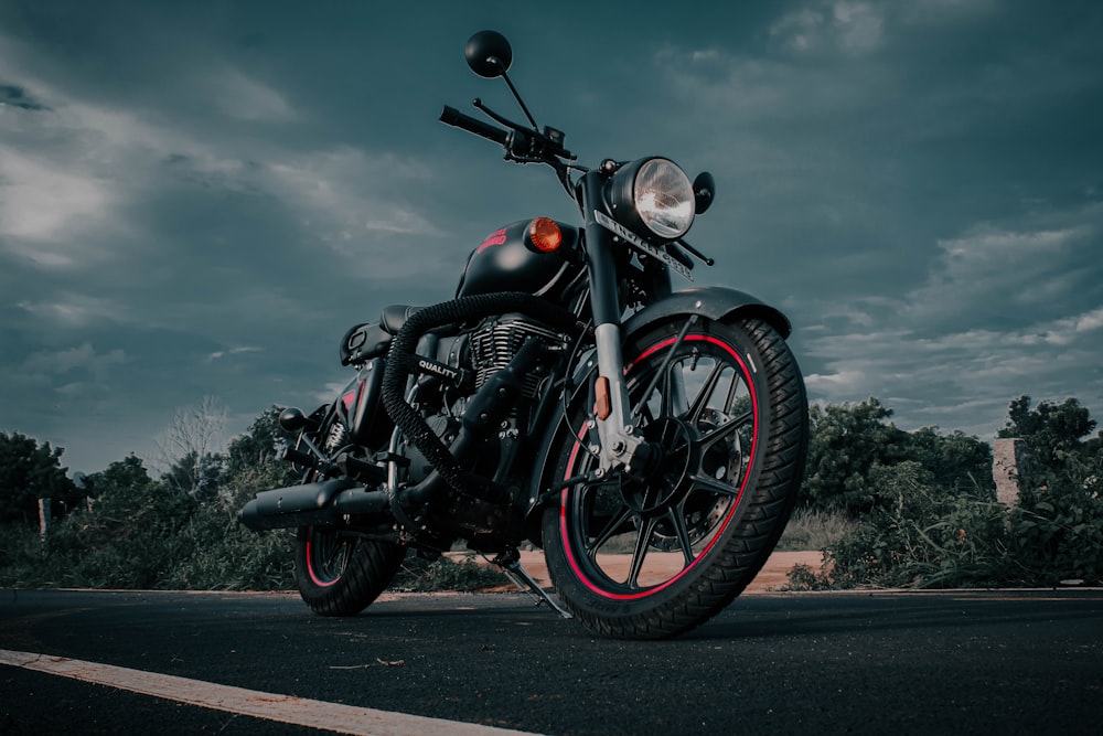 black and silver cruiser motorcycle on road during daytime