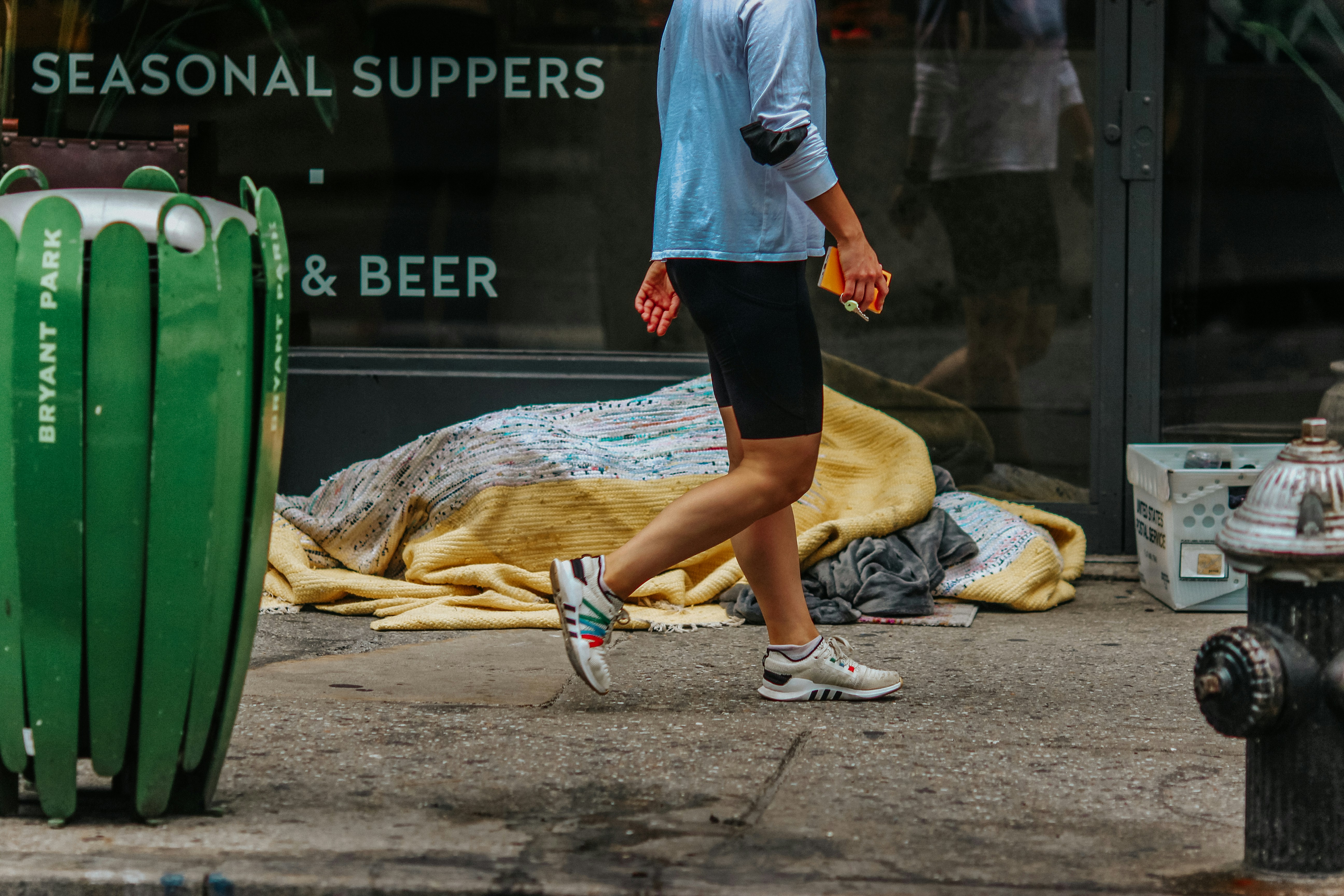 Person going for a walk in a park after a meal to manage glucose