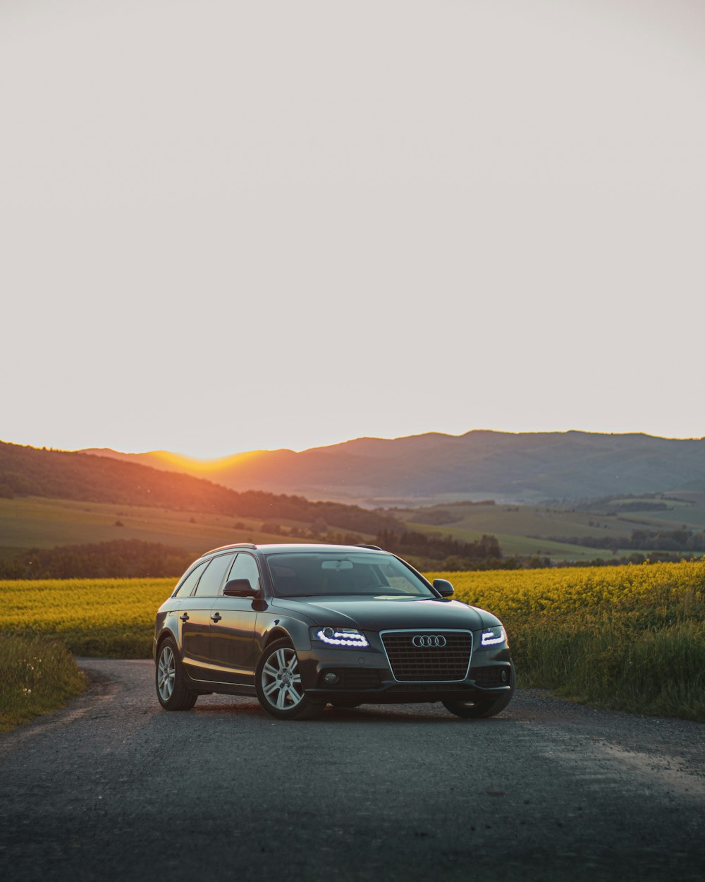 black audi a 4 on road during daytime