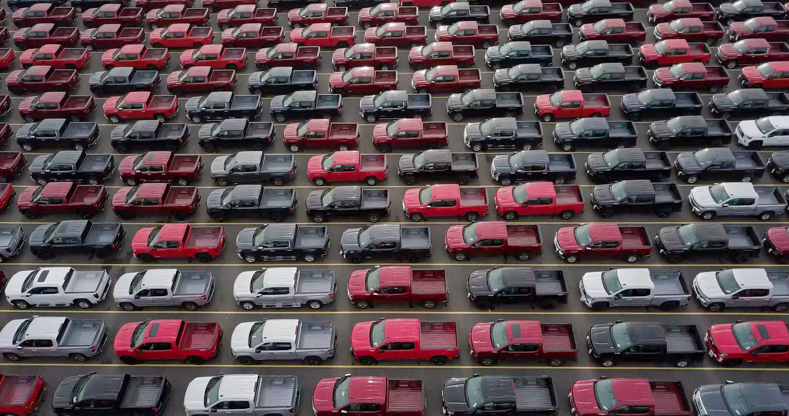 Rows of dealership vehicle inventory