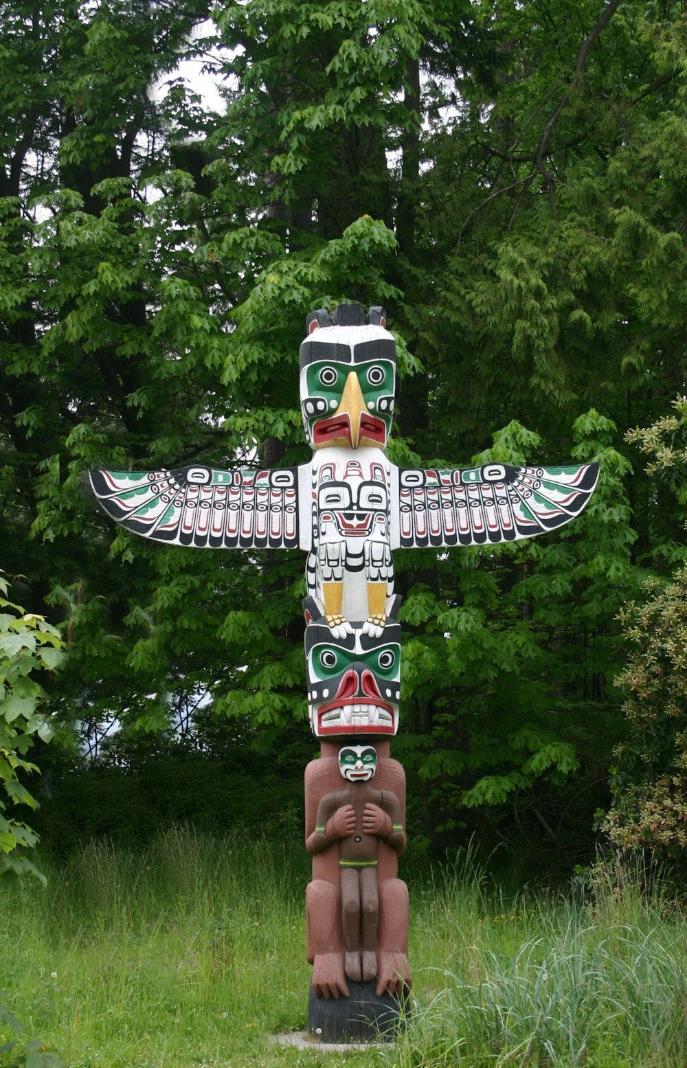 brown and white wooden statue