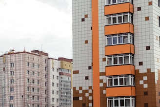 brown and white concrete building during daytime