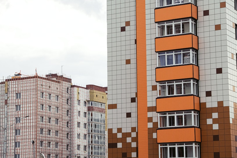brown and white concrete building during daytime