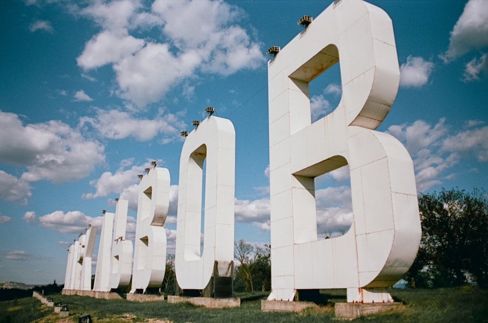 white concrete statue under blue sky during daytime