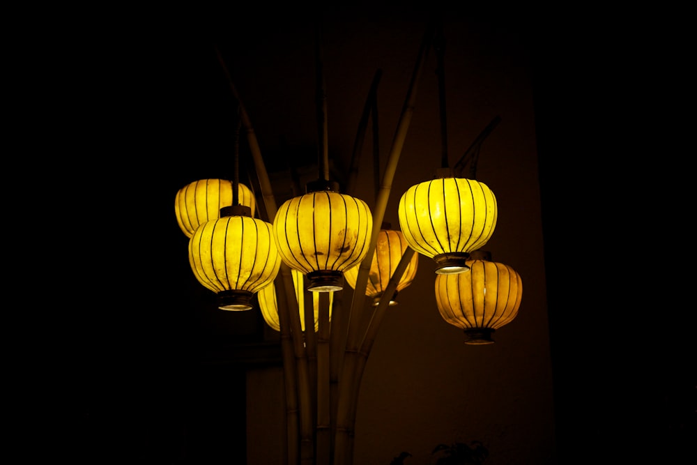 yellow paper lanterns turned on during nighttime